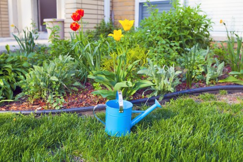 Gardener performing seasonal maintenance in Barnes